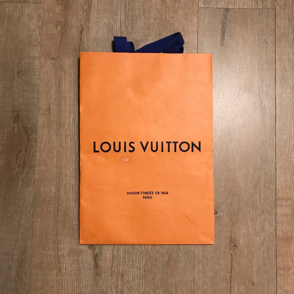 Louis Vuitton orange shopping bag 9.75”x14”